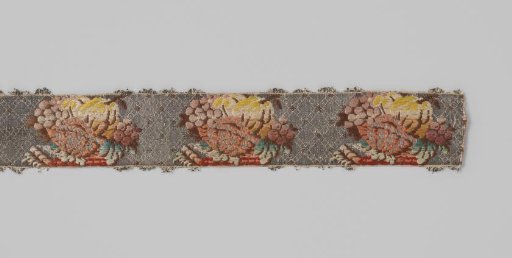 Silk brocade ribbon; on a silver-colored background with a diamond pattern, a repeating pattern of a colored bouquet is applied
