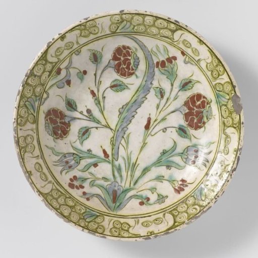 Dish with a stylized flowering plant