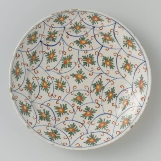 Plate of polychrome painted faience