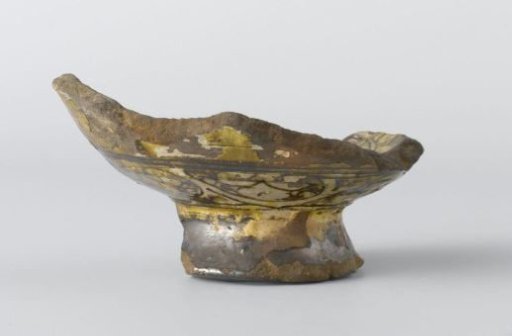 Fragment of a dish with an ornamental border