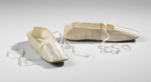 Pair of shoes with ribbon bows