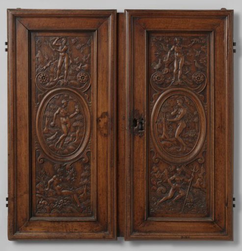 Cabinet door with scrollwork and medallions