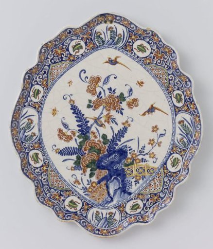 Plate, Painted with Flower Scrolls and a Shrub on a Ground