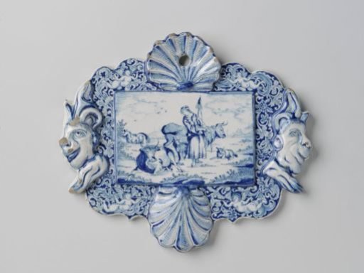 Plate, rectangular, with two shells and two fool's heads in relief