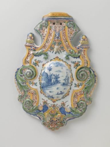 Appliqué in cartouche shape, with landscape