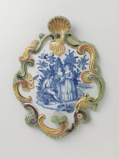 Appliqué, multicolored painted with a landscape with figures