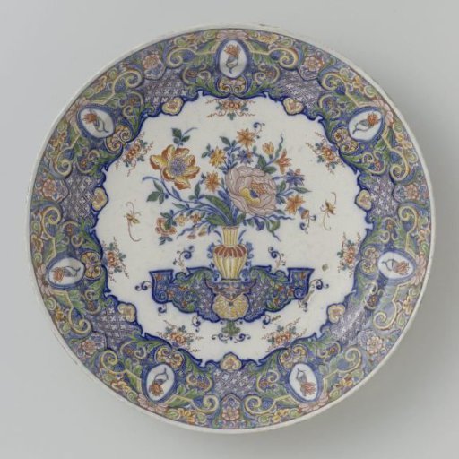 Dish painted with a vase with flowers and lambrequin border