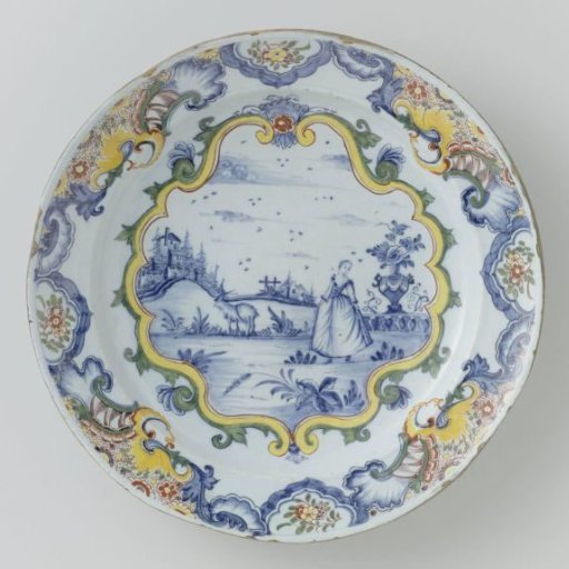 Dish of multicoloured painted faience