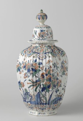 Lid of a multicolored painted faience vase