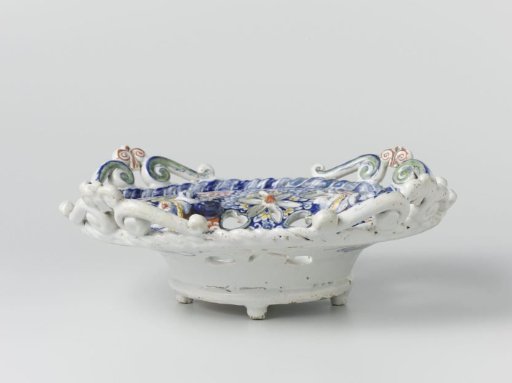 Basket of polychrome painted faience