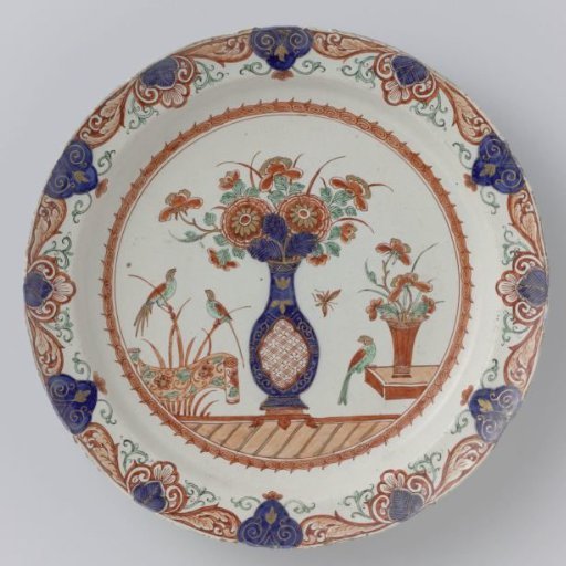 Faience dish with flower vase and birds