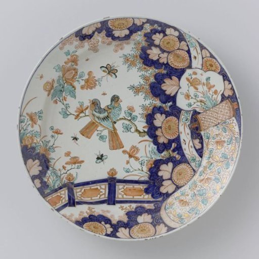 Dish of multicoloured painted faience
