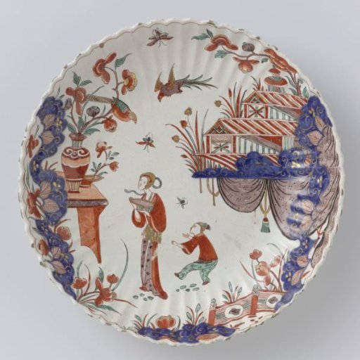 Round bowl of polychrome painted faience with Japanese decoration