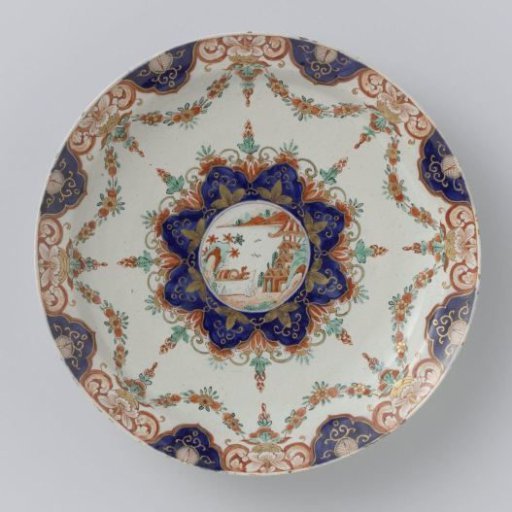 Plate of multicoloured painted faience