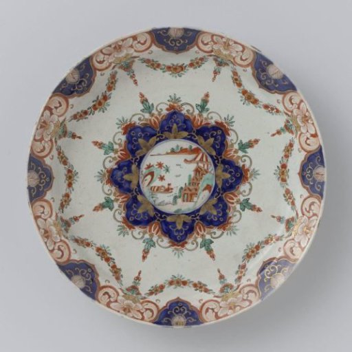 Plate of multicoloured painted faience
