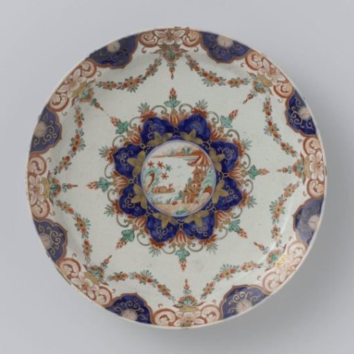 Plate of polychrome painted faience