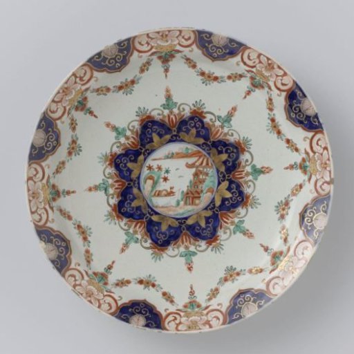 Plate of multicoloured painted faience