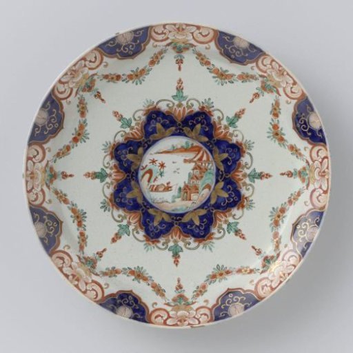 Plate of multicoloured painted faience