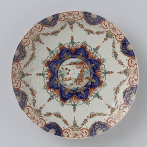 Plate of multicoloured painted faience