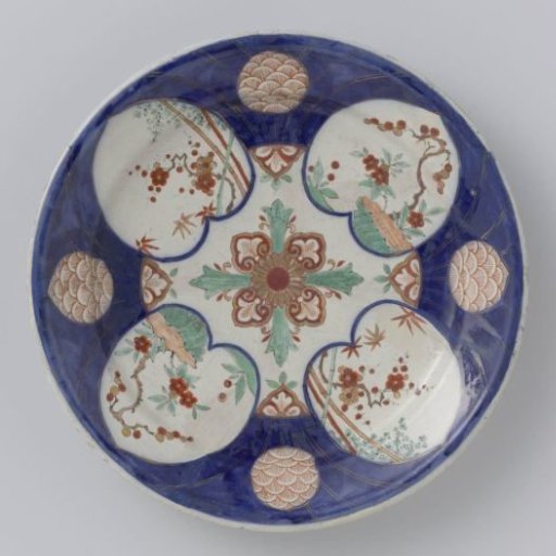 Plate of multicolour painted faience
