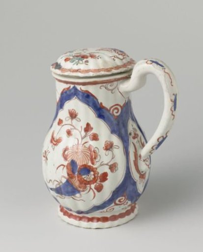 Milk jug of ribbed, multicolour painted faience with decoration of a cornucopia filled with flowers