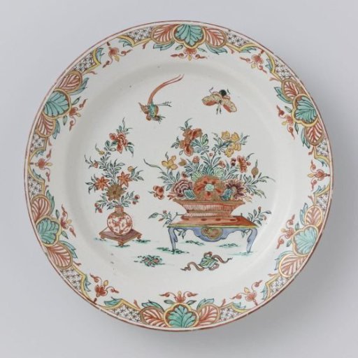 Plate of polychrome painted faience