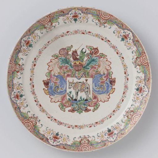 Plate of polychrome painted faience with a family coat of arms
