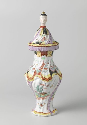 Three vases, parts of a cabinet suite