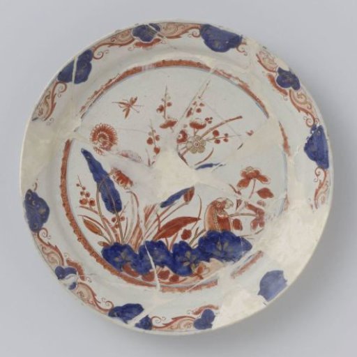 Plate of multicolour painted faience