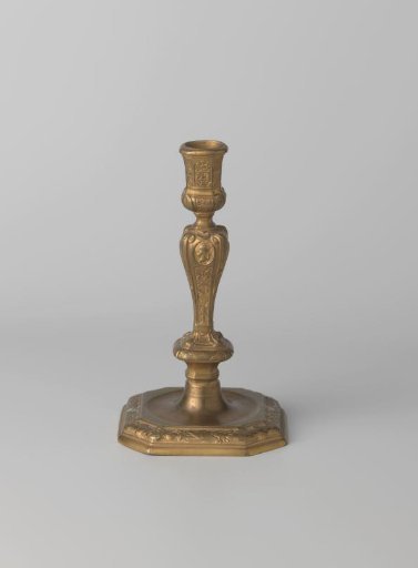 Bronze candelabrum on a square base with trophies, weapons and musical instruments