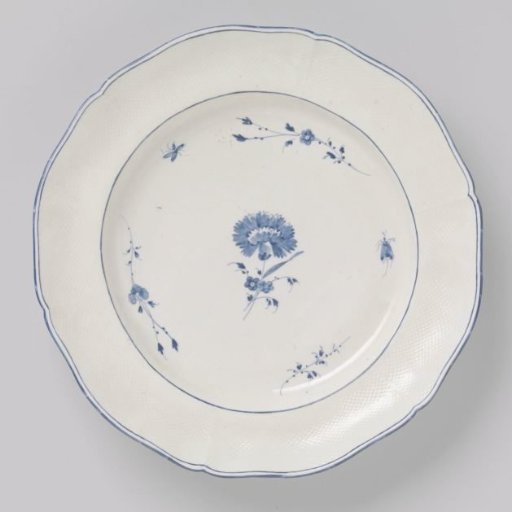 Dish with flower sprays and insects