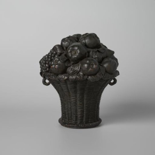 Basket with fruit of lead-glazed earthenware