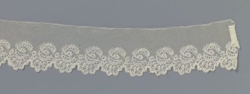 Strip of bobbin lace with ovals formed by curved leaves