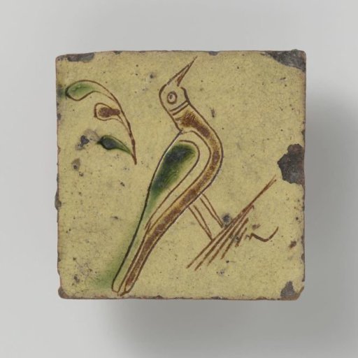 Tile with a dove on a branch