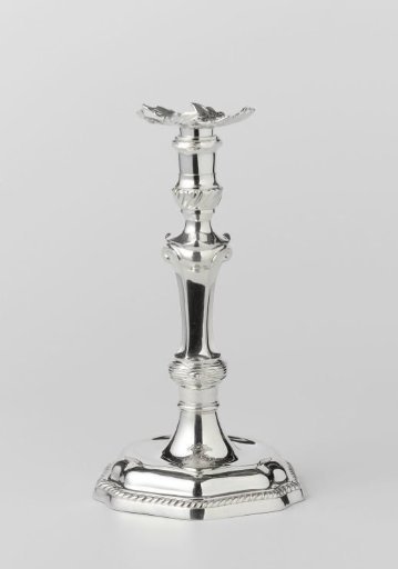 Silver candelabrum with hexagonal base and stem and drip pan in the form of a lobed leaf. Coat of arms of Rotterdam engraved on the base