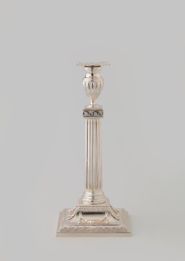 Candelabrum on a square base with fluted stem and vase-shaped candle holder