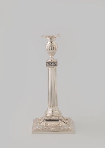 Candelabrum on a square base with fluted stem and vase-shaped candle holder