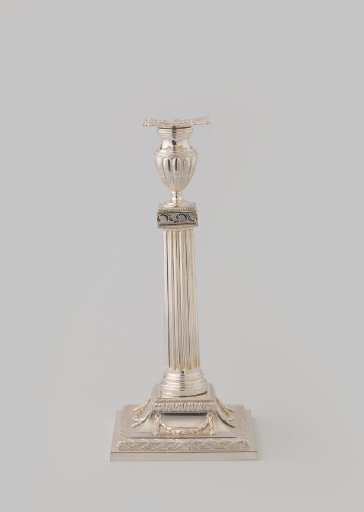 Candelabrum on a square base with fluted stem and vase-shaped candle holder