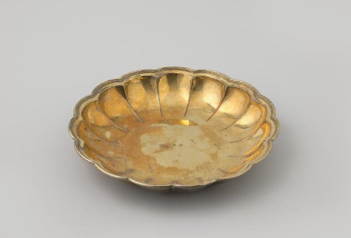 Silver bowl, round and lobed, gilded on the interior.