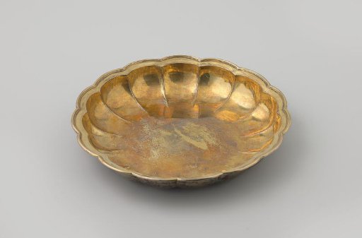 Silver bowl, round and lobed, with gilded interior.