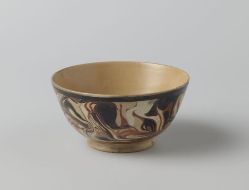 Dish of hard-baked earthenware; Whieldon ware.