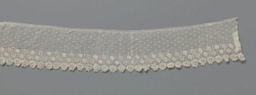 Strip of needle lace decorated with a leaf and flower border and sprigs
