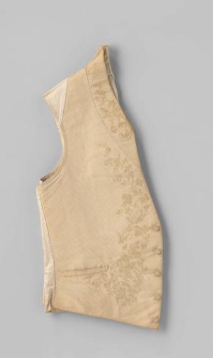 Waistcoat of heavily ribbed cream linen (?), embroidered in cream silk with floral and leafy vines