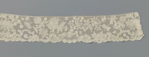 Strip of bobbin lace with flying insects among flower branches
