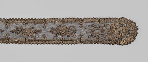 Shawl of black and yellow silk, decorated with floral and leaf work