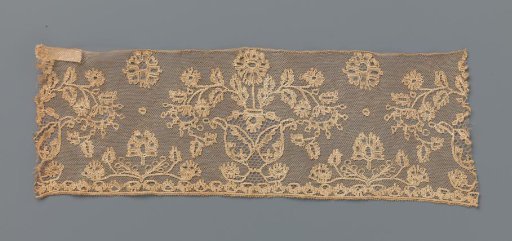 Strip of bobbin lace with a decorated flowerpot
