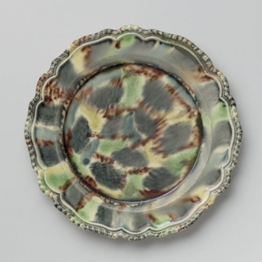 Round plate of hard-baked earthenware; Whieldon tortoise shell.