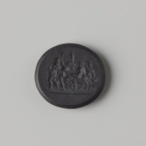 Seal stamp of black stoneware with a representation of a Bacchic procession from the factory of Wedgwood and Bentley