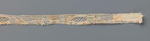 Strip of bobbin lace with whimsically framed cartouche and three-lobed motif