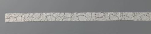 Bobbin lace insert with a wavy vine with peonies